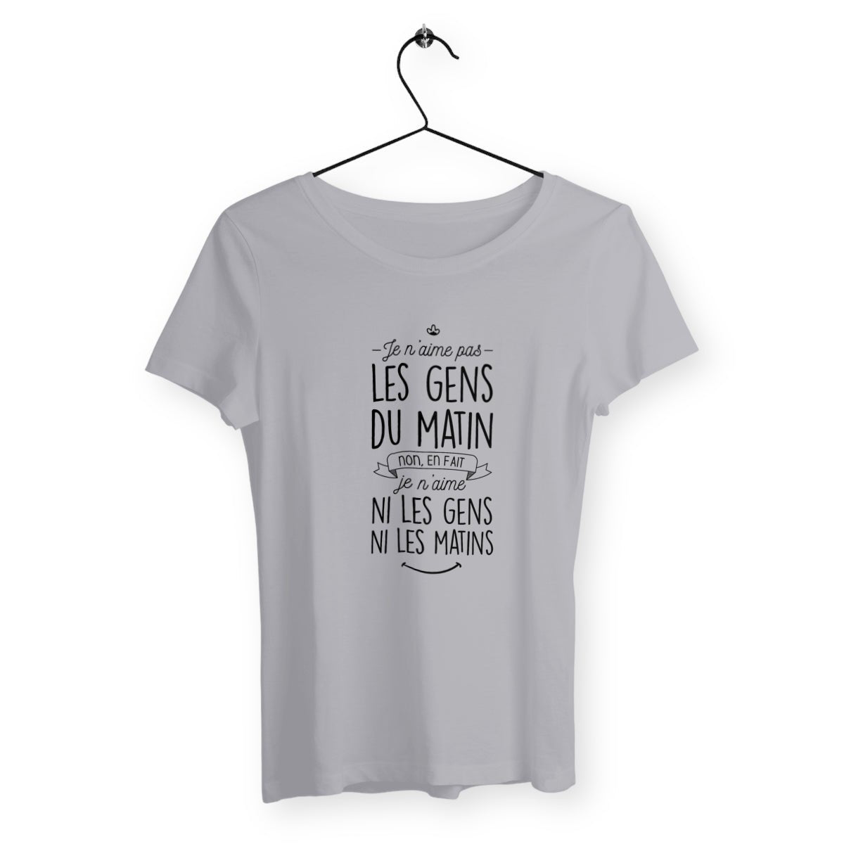 T-shirt femme avec l'inscription "Je n'aime pas les gens du matin", un modèle drôle et décalé pour celles qui préfèrent la tranquillité du matin. Confortable et humoristique, parfait pour afficher votre humeur du jour.