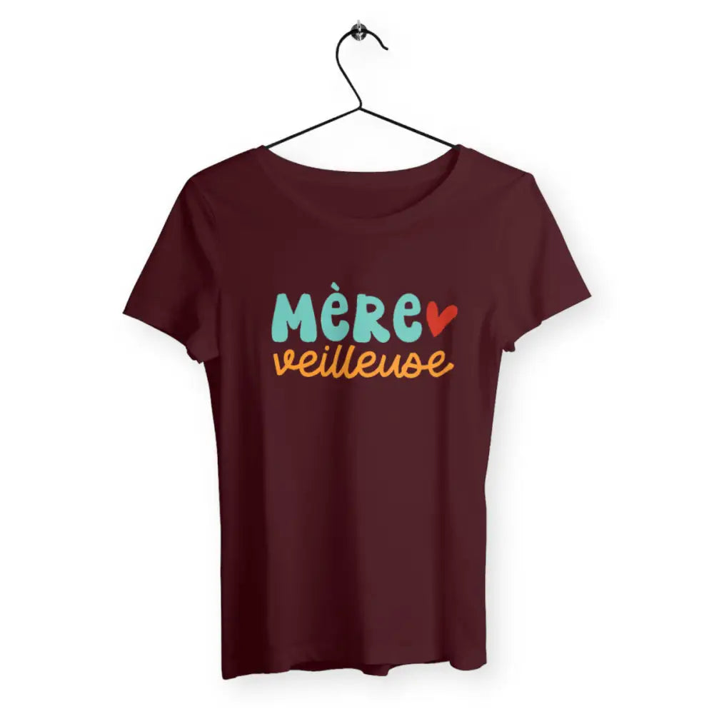 T-shirt femme avec l'inscription 'Mère Veilleuse', un design doux et tendre, parfait pour célébrer le rôle protecteur et lumineux d'une maman.