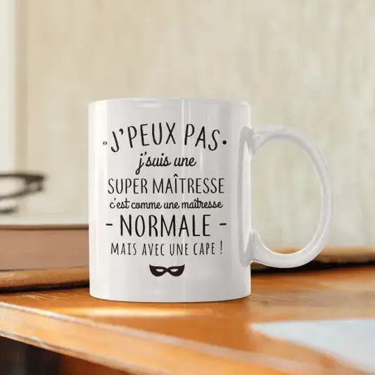 Mug céramique - J’peux pas j’suis une super maîtresse c’est comme une maîtresse normale mais avec une cape! Blanc - Mugs