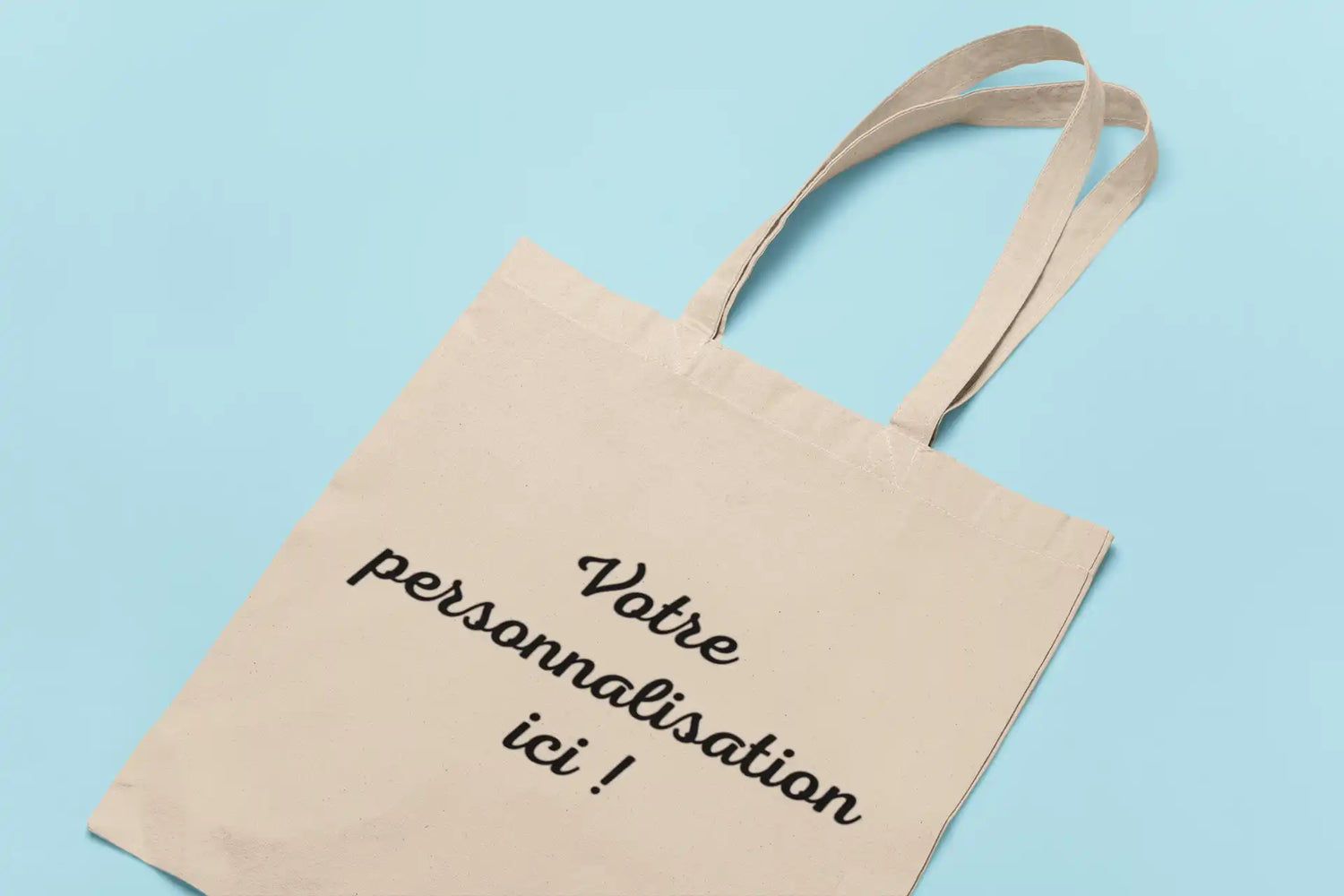 Un sac en toile beige personnalisé.