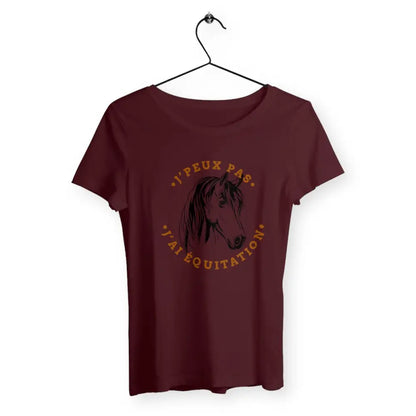 T-shirt femme - J'peux paT-shirt femme avec l'inscription "J'peux pas, j'ai équitation", un modèle dynamique et élégant pour les passionnées d'équitation. Confortable et stylé, parfait pour afficher votre amour pour les chevaux et ce sport avec humour.s j'ai équitation - #shop_name - Premium Plus