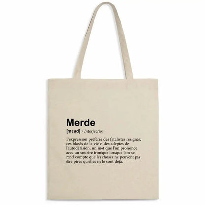 Totebag en coton biologique avec une impression humoristique façon dictionnaire de la définition du mot "merde", sac léger de 160 g, taille unique, esprit décalé et écologique.